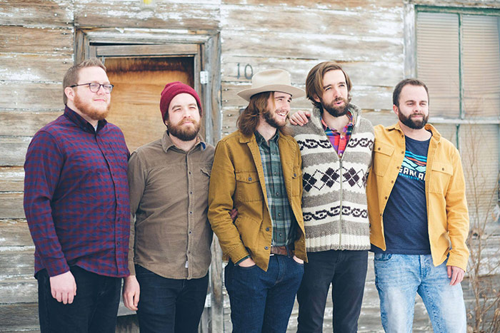 Grizzly Goat promo shot of band outside