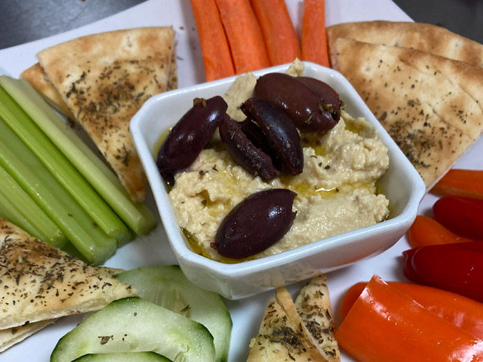 Photo of Hummus Plate showing bread, hummus, and vegetables