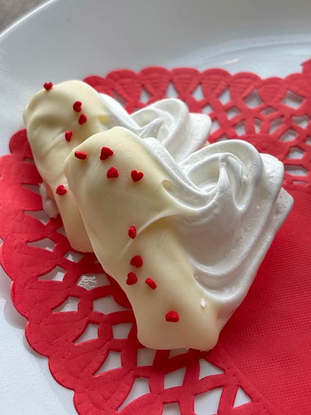 Photo of Sugar Magnolia Cafe Valentine's Tea White Chocolate Dipped Meringue Heart