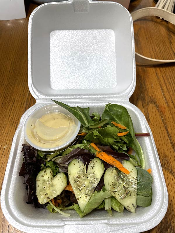 Photo of a salad with heart shaped cucumbers